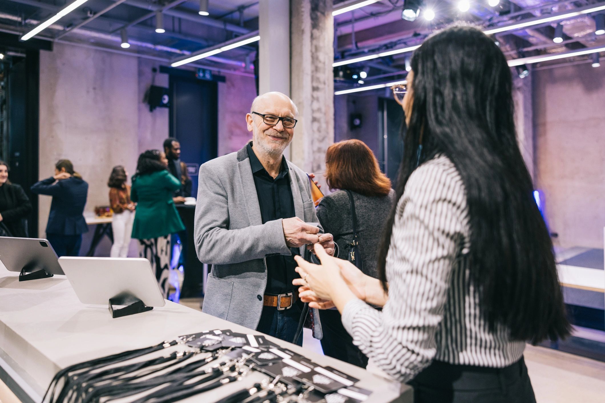 Business professional at a conference registration desk