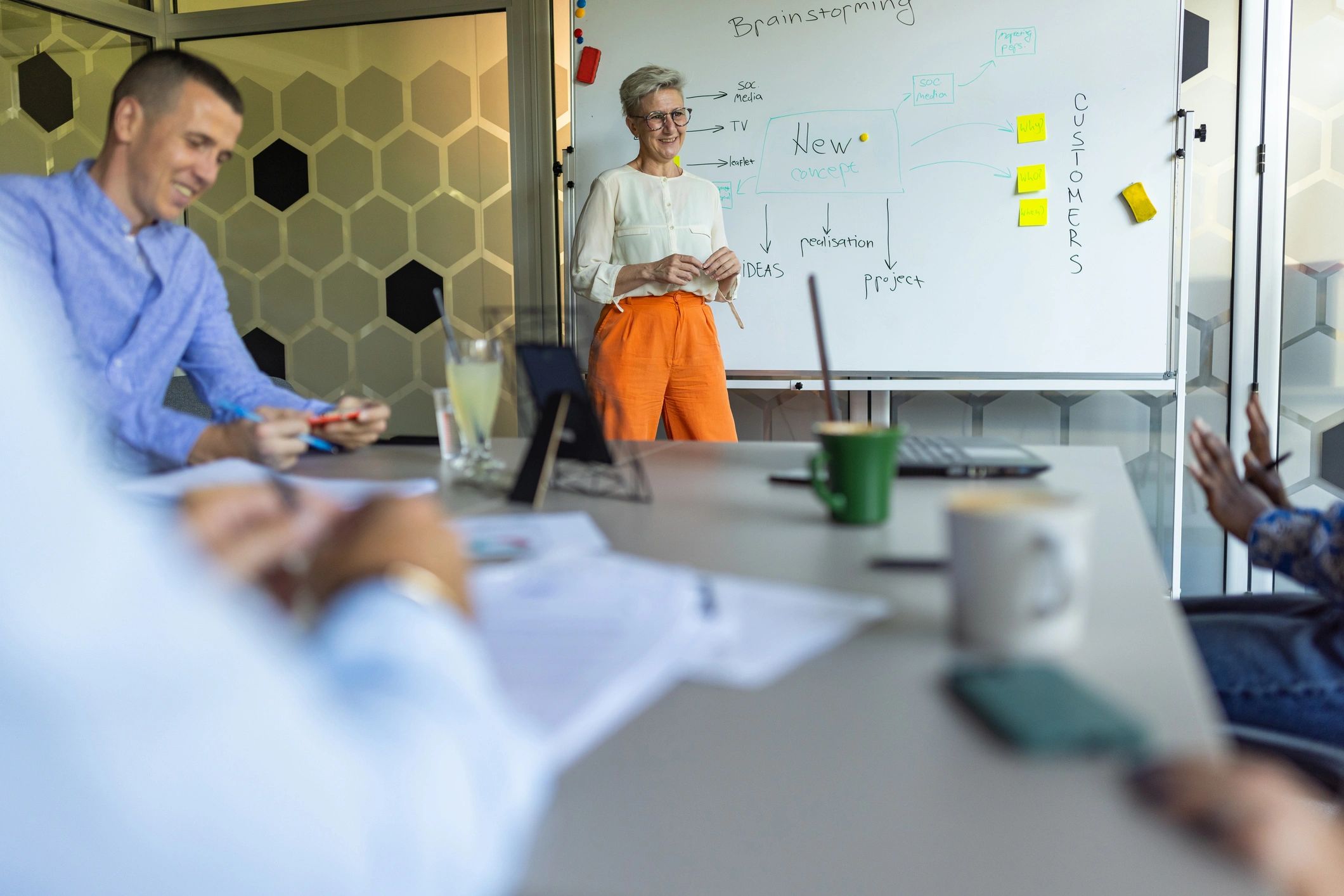 Senior businesswoman leading a business meeting at the board room