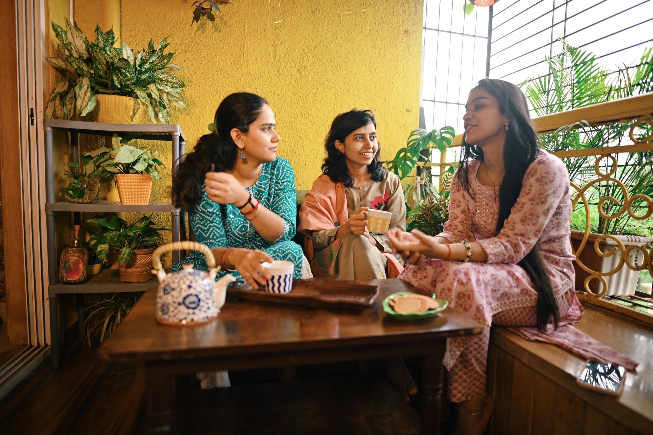 Women friends meeting up for a cup of tea