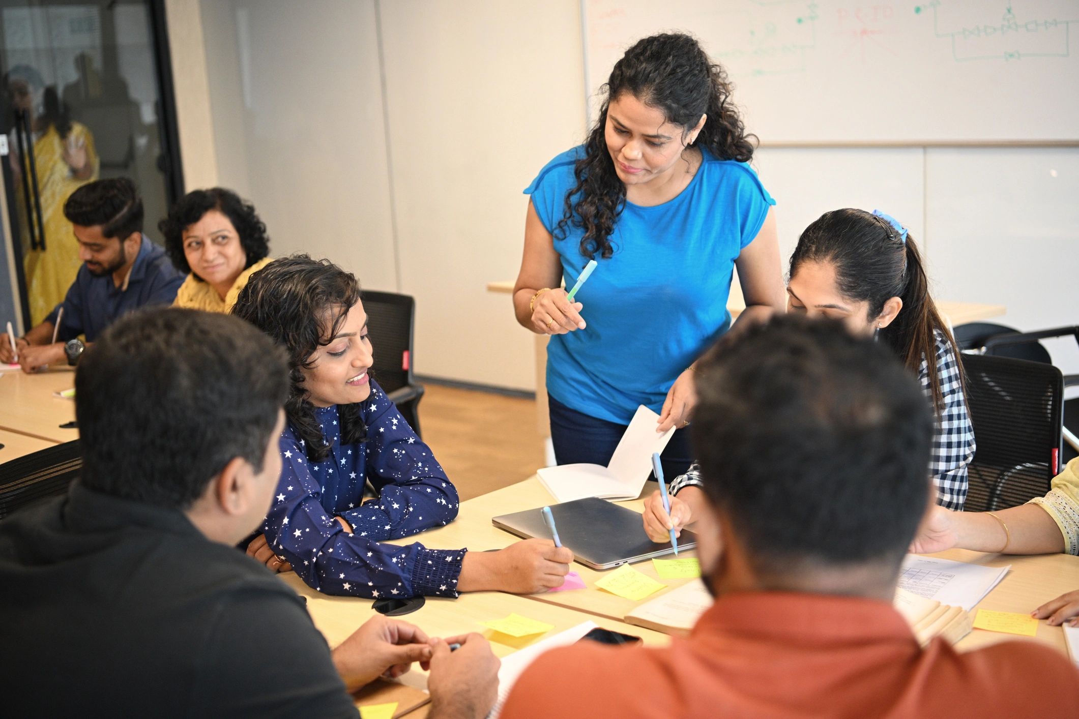 Facilitator leading a wellbeing or learning session